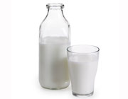 glass and carafe of milk