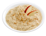 bowl of oatmeal with apple slices