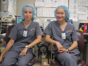 Summer volunteers in surgical scrubs
