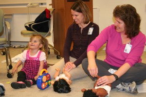 A lesson in infant massage at a Charlottesville Mended Little Hearts meeting