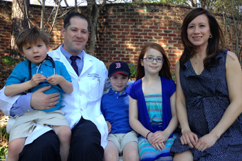 Transplant surgeon Bartholomew Kane with his family