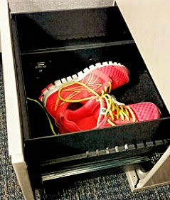 Running shoes in my office desk