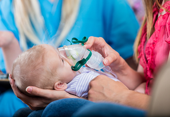 During house calls, Ogan help parents learn to manage their children's ventilation tubes and other medical equipment.