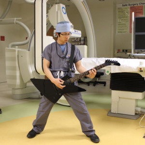 doctors at play: uva neurosurgeon kenneth liu playing guitar