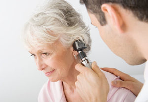 patient getting an ear exam