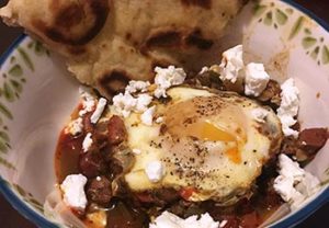 shakshuka, a dish with eggs and tomatoes