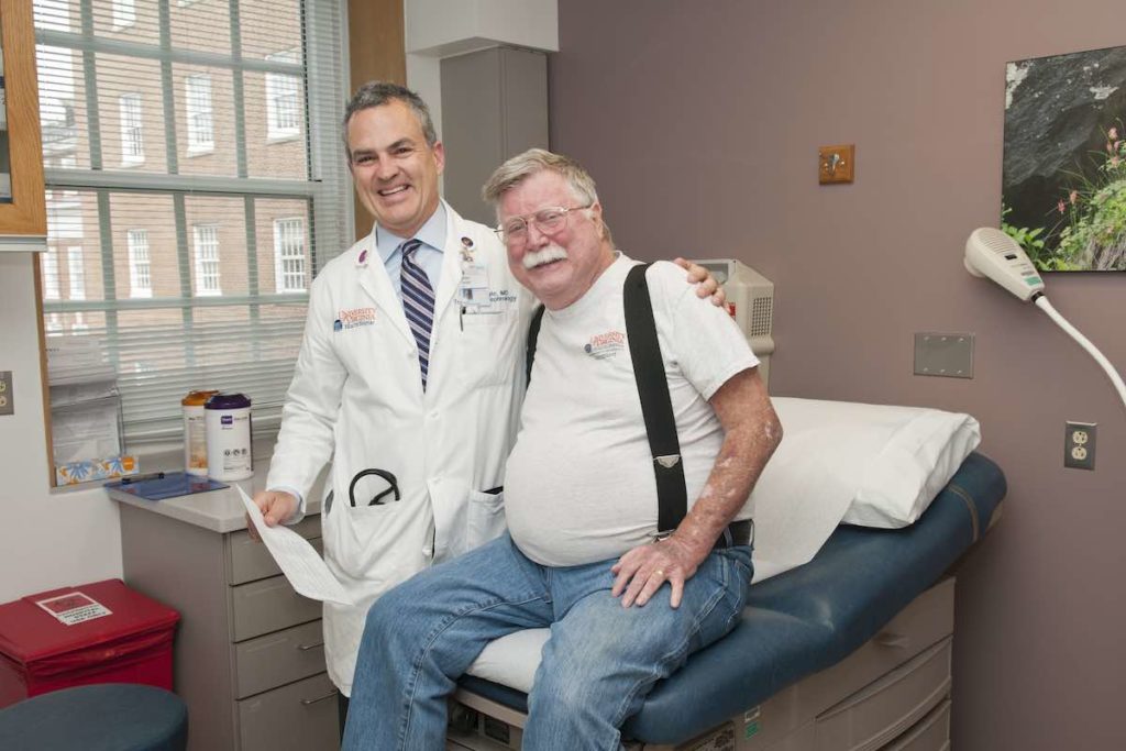 transplant recipient, Pat, with his doctor