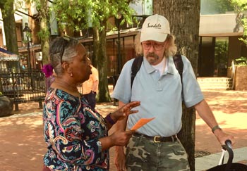 sharing UVA cancer clinical trial info in downtown Charlottesville