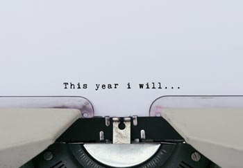 Typewriter with "This year I will..." Let's make a healthy new year's resolution!