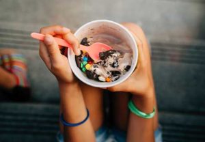 A cup of ice cream with cookies & candy poses a threat to the diet