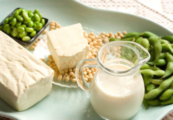 natural alernatives to statins include soy products like soybean pods, tofu, milk on serving dish