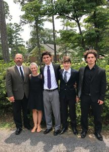 Krista with her husband and sons