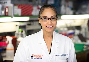 Francine Garrett-Bakelman in her lab, smiling. Her NASA work was among our top stories of 2019