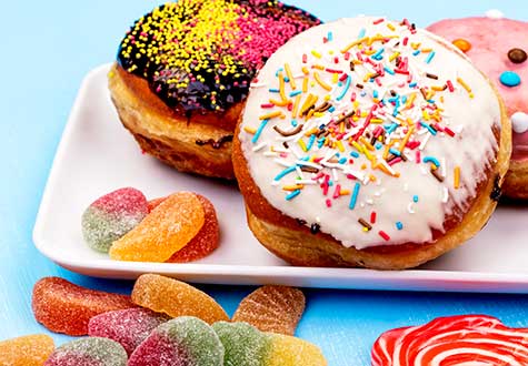 colorful donuts and candy make it hard to stop eating sugar