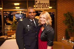 Patient Alec Gunn poses with wife in decorated military uniform