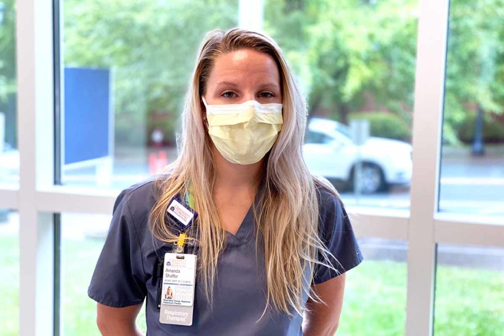 respiratory therapist Amanda Shaffer wearing scrubs and a mask