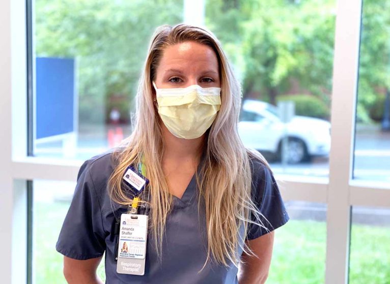 respiratory therapist Amanda Shaffer wearing scrubs and a mask