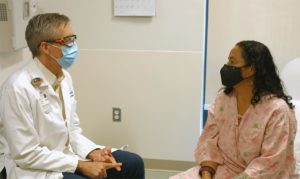 Patient Margarita Figueroa consults with breast oncologist Patrick Dillon, MD
