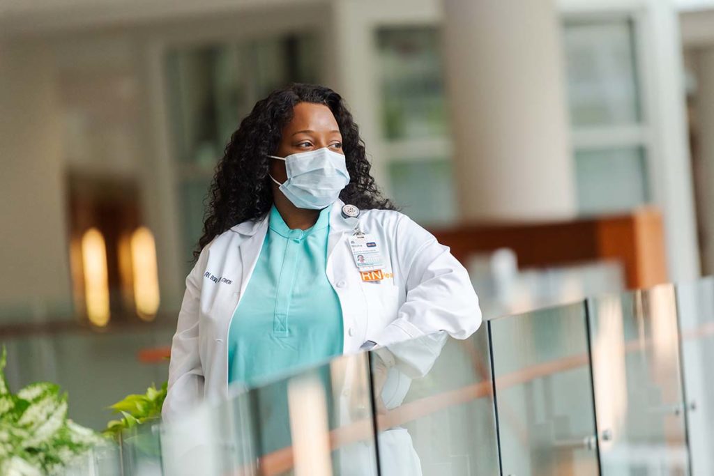 A UVA nurse looks into the lobby