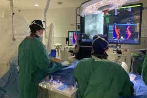 UVA Health Aortic Center co-director Bezhad Farivar, MD, performs a procedure with a fellow at UVA Aortic Center.