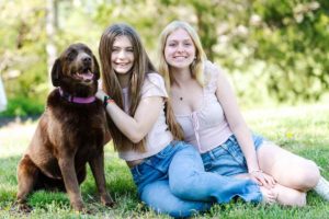 Anna sitting next to her sister Grace