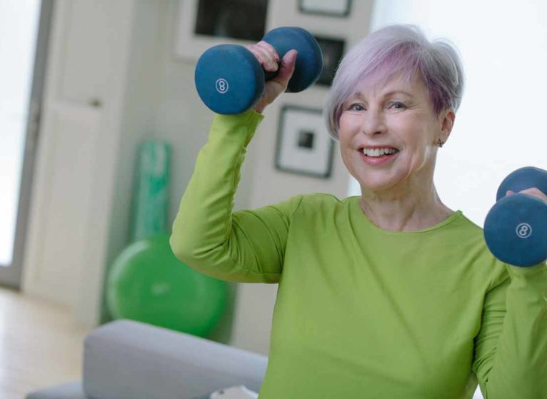 stroke survivor lifting weights. Her stroke was likely caused by common and uncommon causes