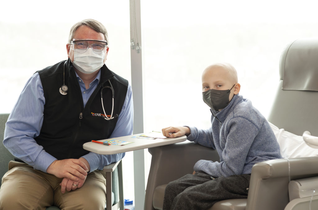 childhood cancer patient with doctor