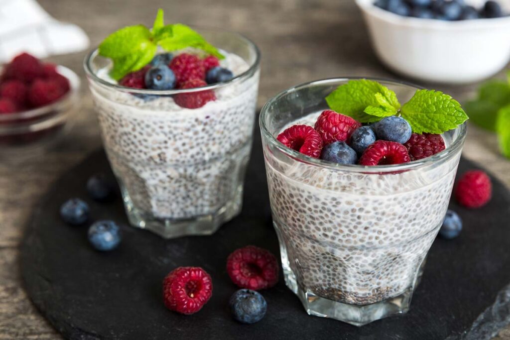 Vanilla pudding with chia seeds topped with fresh berries