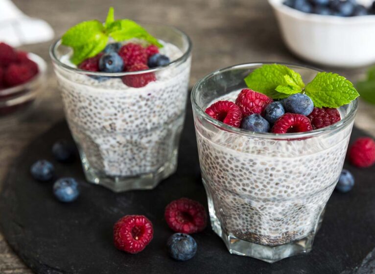Vanilla pudding with chia seeds topped with fresh berries