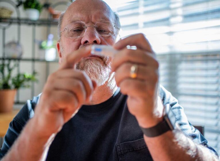 Man checking his blood sugar