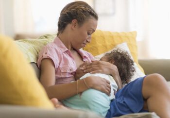 women breastfeeding her baby