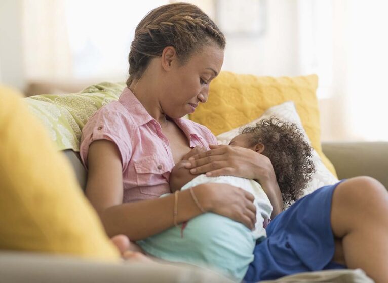 women breastfeeding her baby