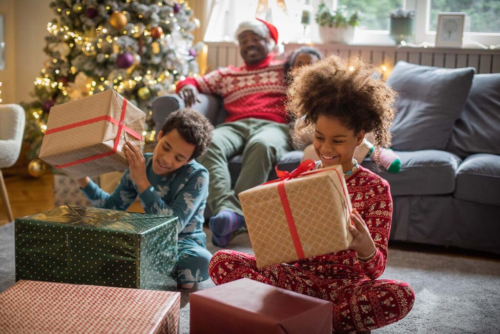 Kids opening holiday presents