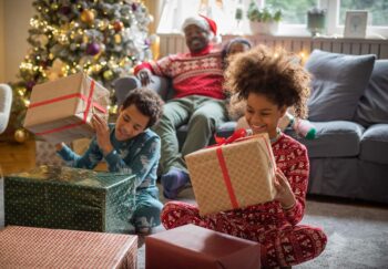 Kids opening holiday presents