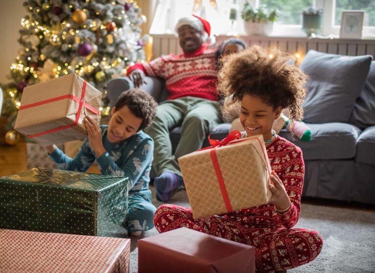 Kids opening holiday presents