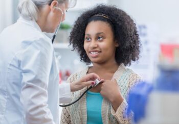 young girl directs her yearly physical