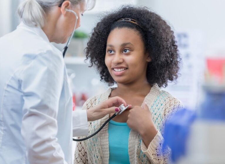 young girl directs her yearly physical