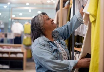 A woman shopping for ostomy clothing